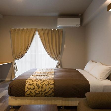 Mr. Kinjo In Nishizaki Lejlighedshotel Itoman Eksteriør billede
